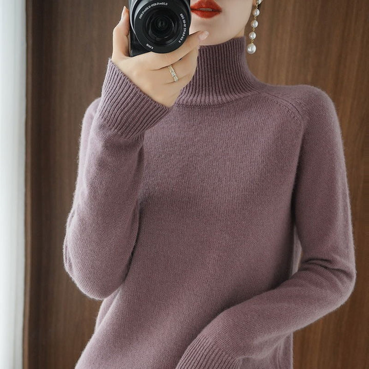 Full length shot of women's turtleneck sweater, offering a sleek, minimalist silhouette for any outfit.