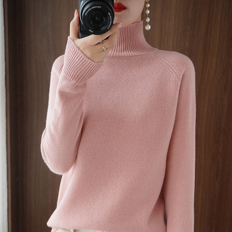 Model wearing a cozy women's turtleneck sweater, illustrating its comfortable fit and versatile everyday style.
