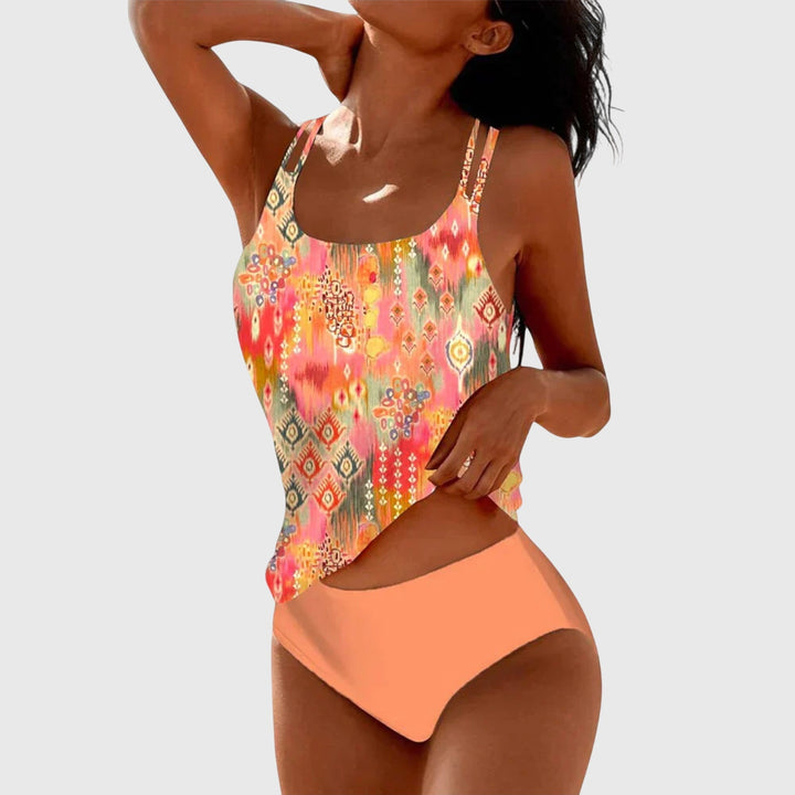 Close-up of a women's printed strappy tankini swimsuit showcasing the unique pattern and straps.