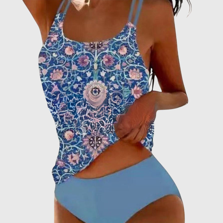 Comfortable women's tankini swimsuit with a fun print and strappy design, great for any summer activity.