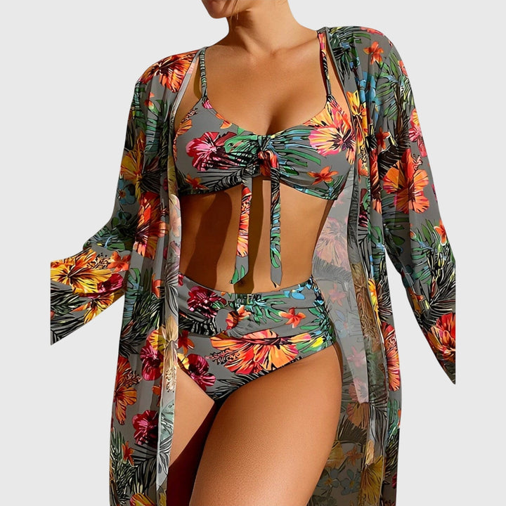 Stylish women's bikini set with vibrant tropical print, ideal for vacation outfits and resort wear.