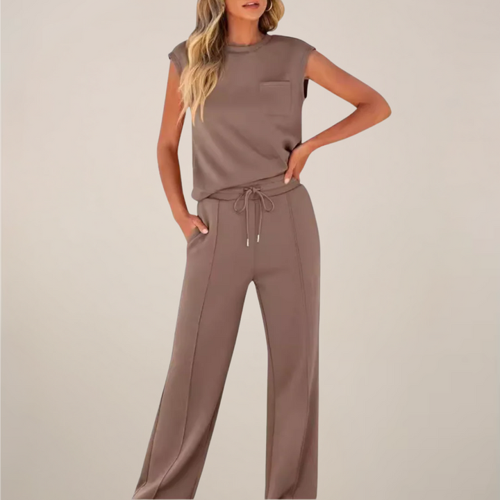 Relaxed fit women's pants set in soft fabric, featuring drawstring detail, great for spring fashion.