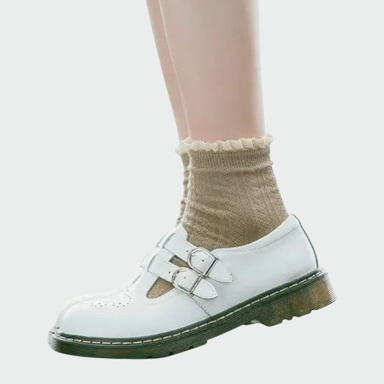 Classic black and white leather Mary Jane shoes for women with a comfortable block heel