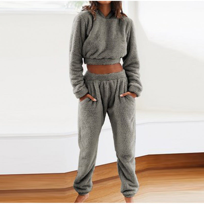 Chic women's lounge set: soft hooded sweatshirt & drawstring joggers for ultimate comfort & casual style.