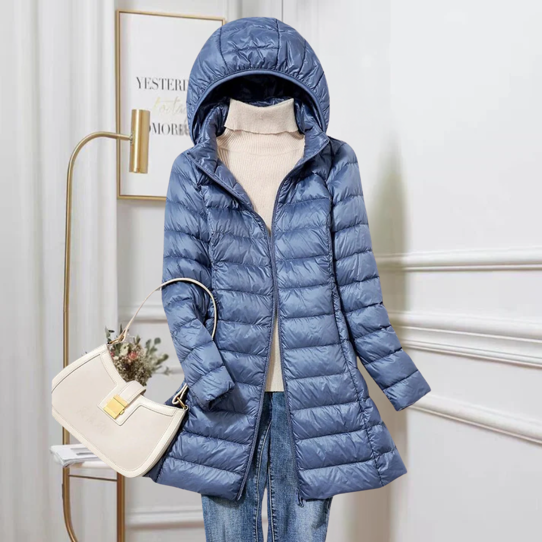 Women's ultra-lightweight packable warm jacket, perfect for travel & outdoor wear.
