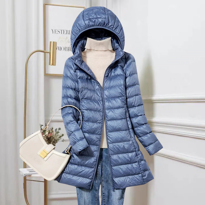 Women's ultra-lightweight packable warm jacket, perfect for travel & outdoor wear.