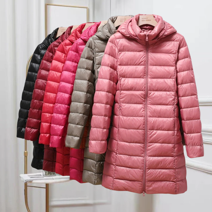 Stylish women's lightweight fall/winter jacket; packable & warm for casual adventures.