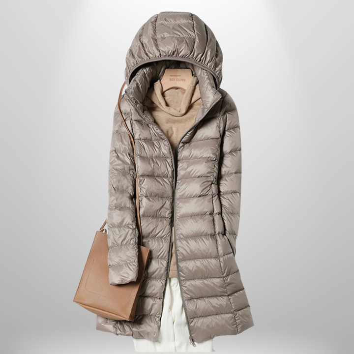 Women's travel jacket, ultra-lightweight & warm, easily packable for any trip.