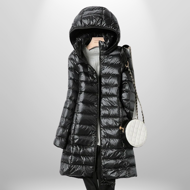 Packable warm jacket for women, ideal for fall, winter, and outdoor activities.