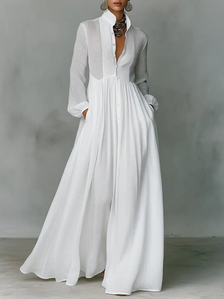 Women's versatile maxi shirt dress with stand collar, button front, & pockets for summer fashion.