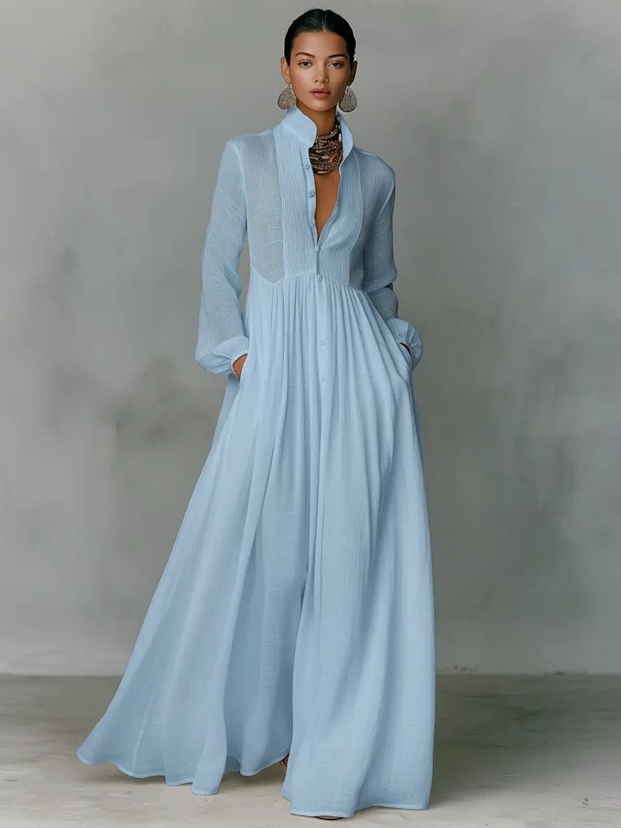 Versatile women's maxi shirt dress for day or office, featuring stand collar, button front & pockets.