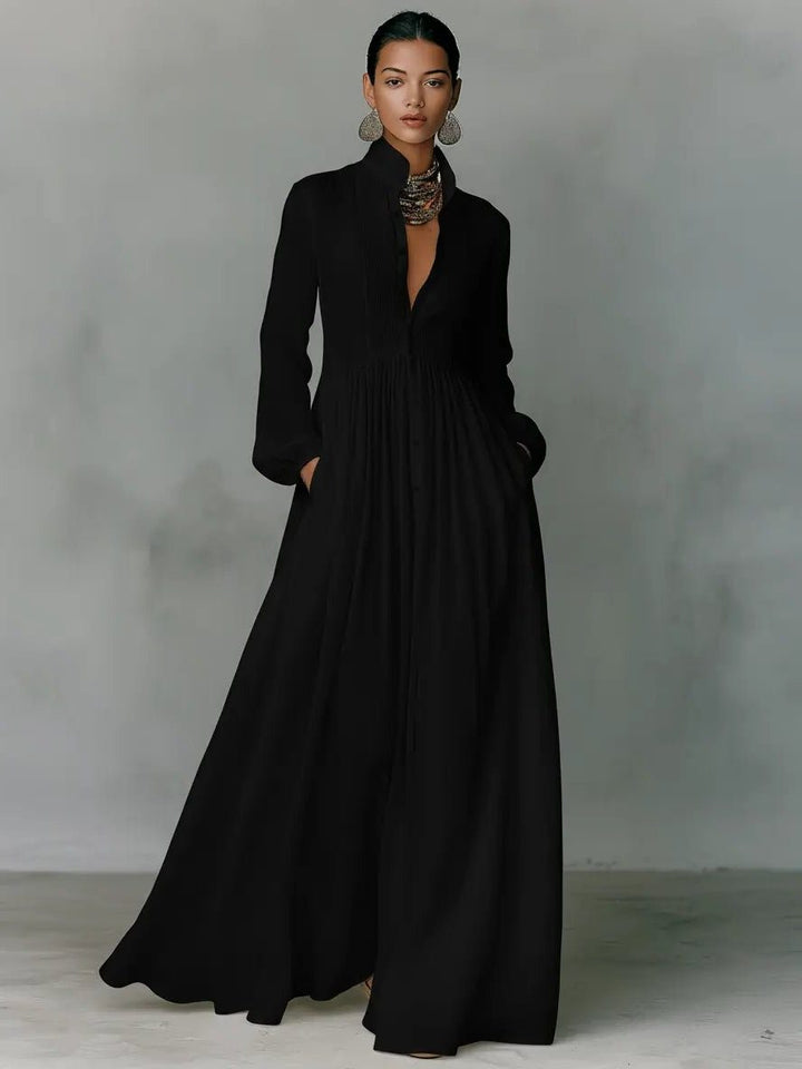 Stylish women's long sleeve maxi shirt dress with stand collar, button-front closure, & practical pockets.