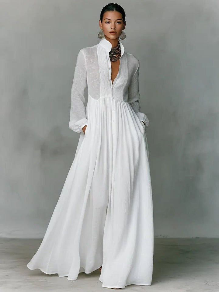 Casual elegant women's maxi shirt dress, button-front, long sleeve, stand collar, and pockets for versatile wear.