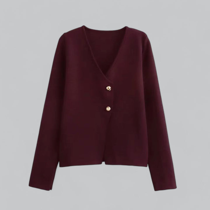 Stylish woman wearing a casual long-sleeve minimalist button cardigan, ideal for summer outfits