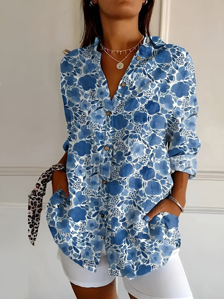 Women's vibrant floral button-front blouse, perfect for summer casual wear and everyday fashionable style.