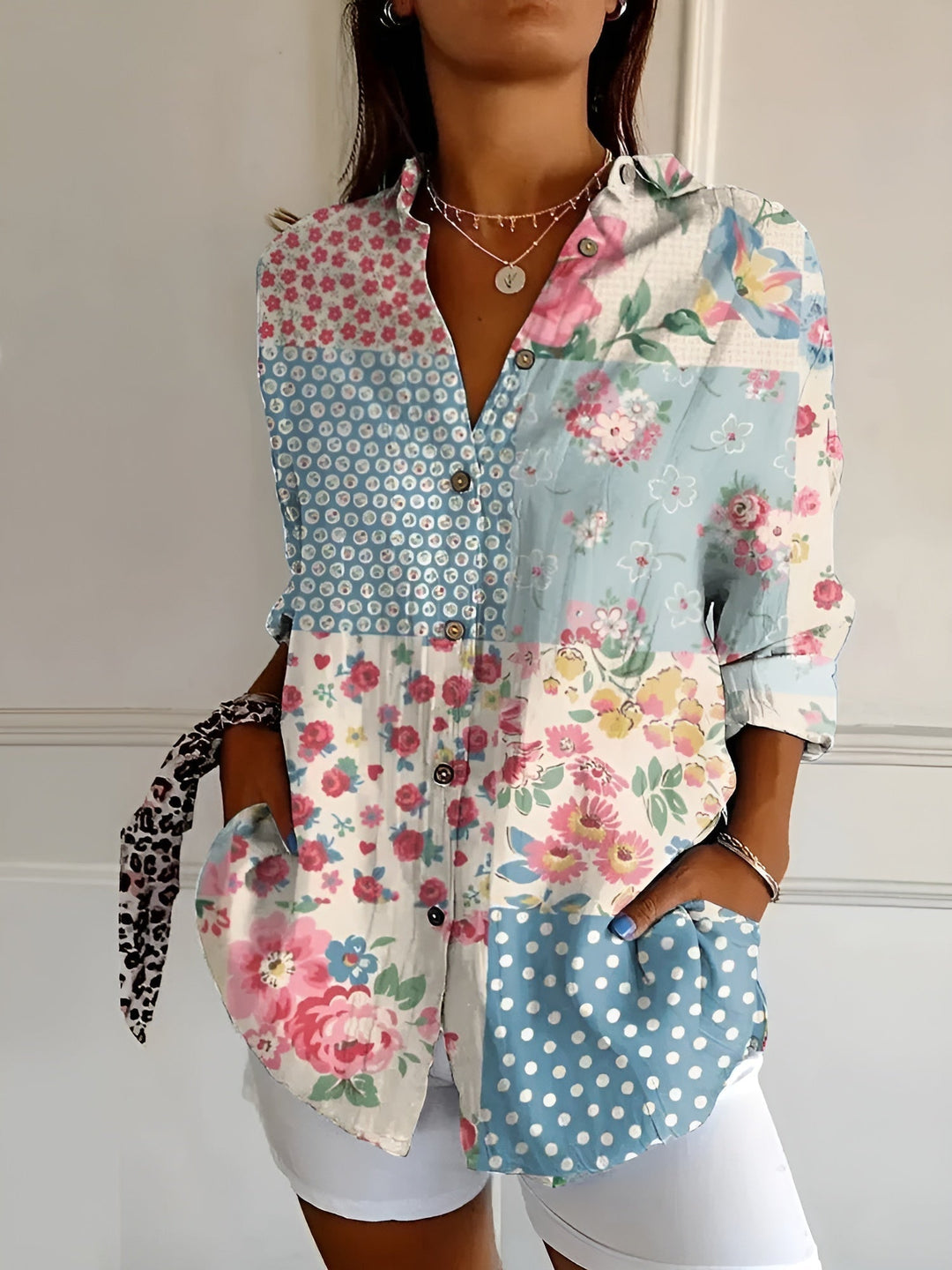 Stylish women's floral printed blouse featuring a full button-front, a chic choice for summer casual outfits.