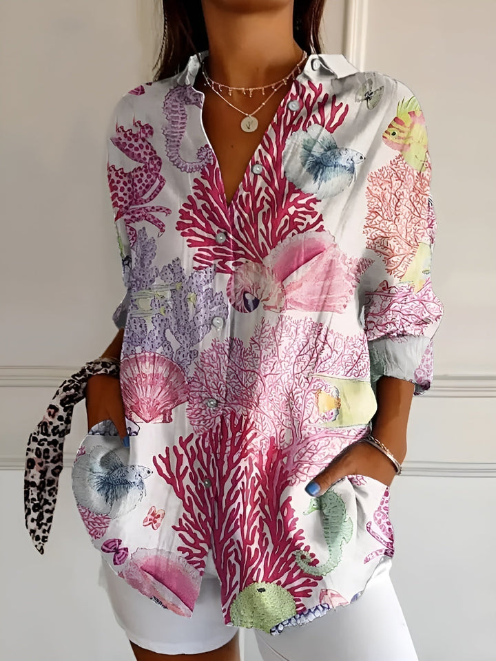 Effortless summer style with this women's vibrant floral button-front blouse, great for casual wear.