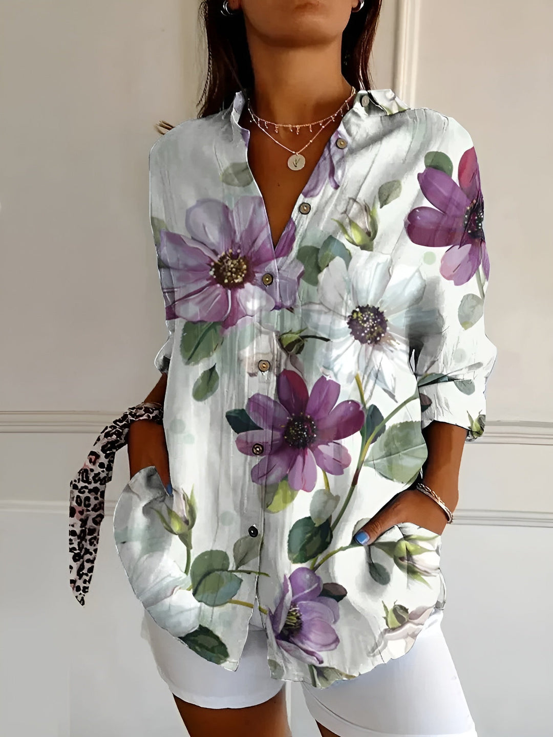 Chic women's summer blouse with a beautiful floral print and classic button-front for effortless everyday style.