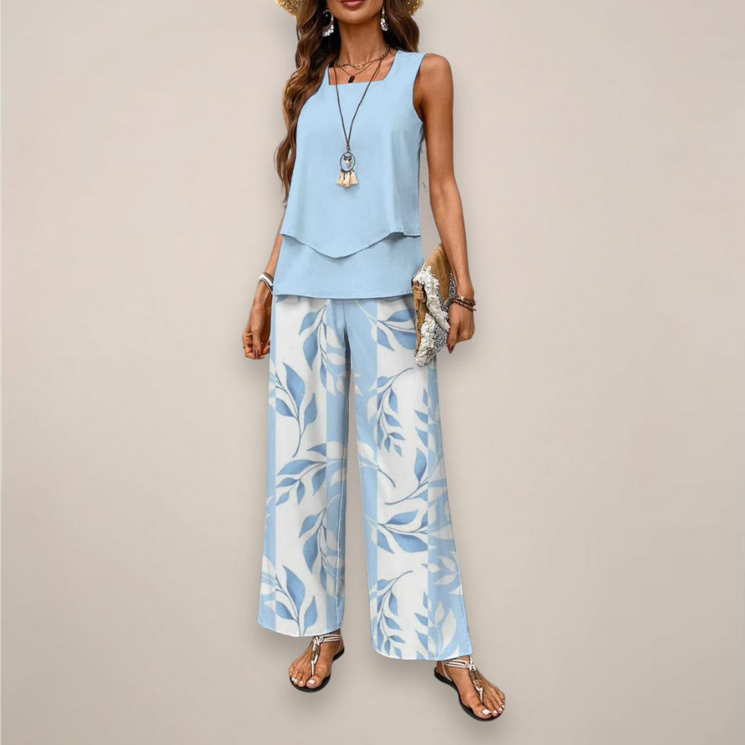 Women's vibrant floral print wide-leg two-piece set, perfect for summer casual wear and beach vacations.