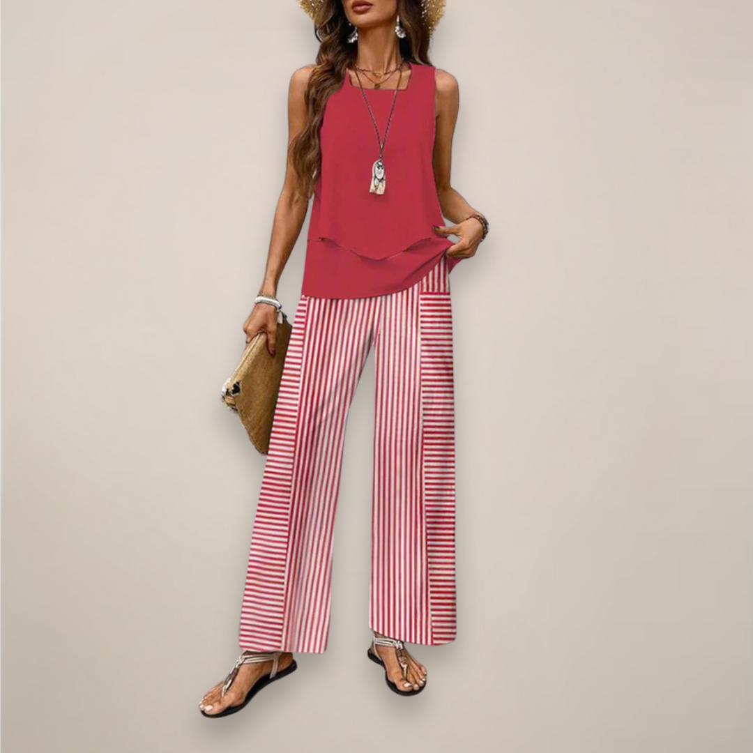 Casual women's summer two-piece outfit featuring a bold print, wide-leg pants and a relaxed fit.