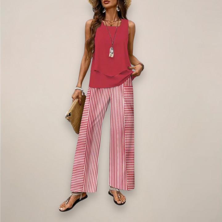 Casual women's summer two-piece outfit featuring a bold print, wide-leg pants and a relaxed fit.