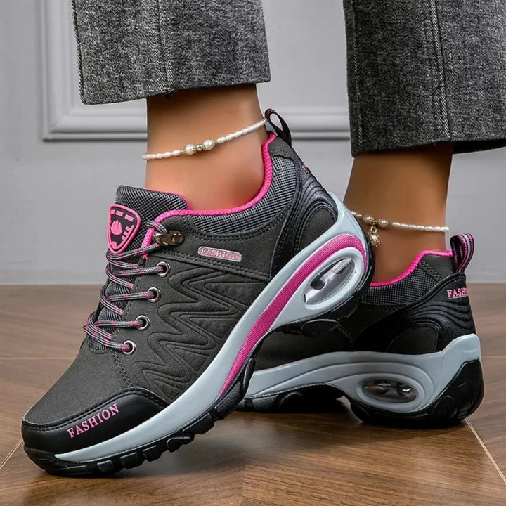 Women's vibrant water-resistant hiking shoes, perfect for comfortable and colorful outdoor trail adventures.