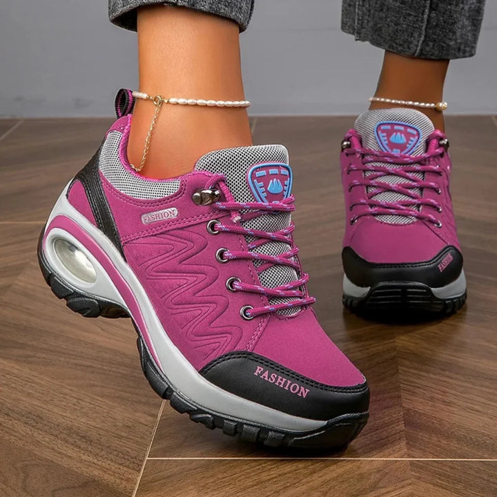 New women's colorful athletic hiking shoes, designed for comfortable and water-resistant performance on trails.