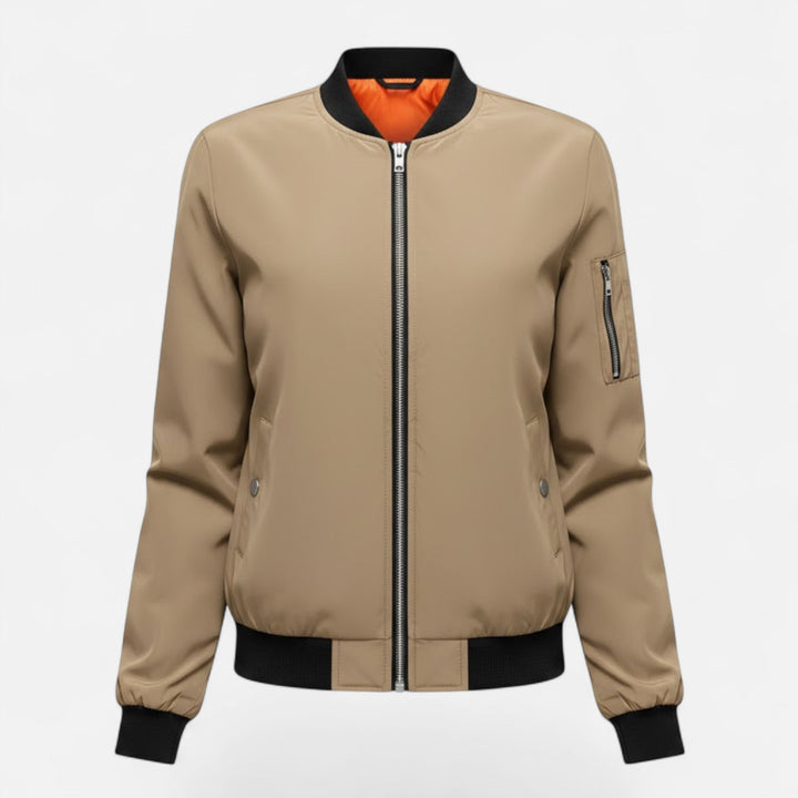 Elegant women's vintage bomber jacket, solid hue, full zip, essential fall fashion piece.