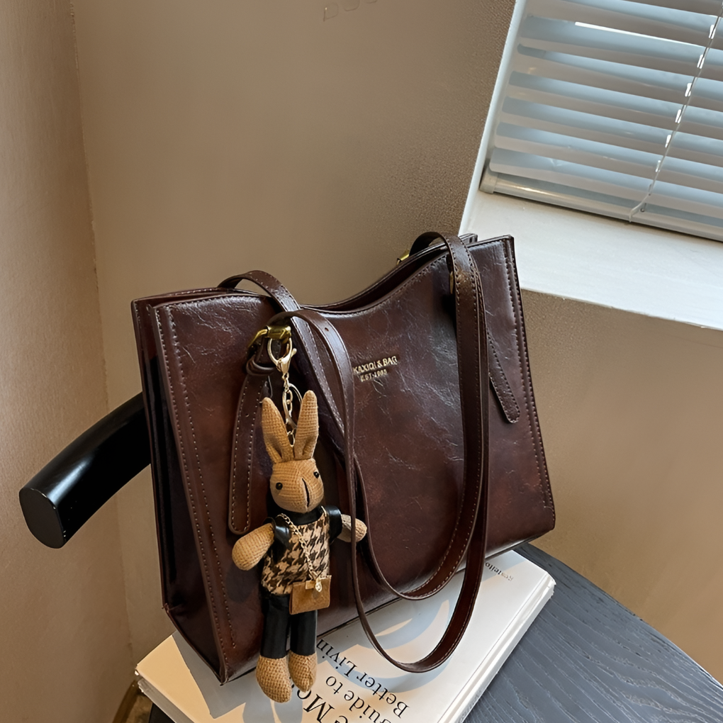 Durable women's vintage leather tote, perfect as a shoulder or crossbody bag