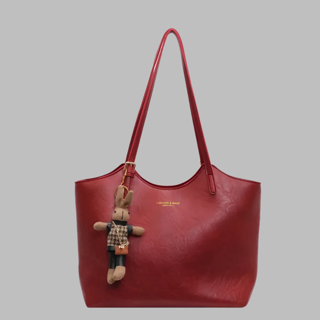 Classic women's leather tote bag in vintage style, functional fashion accessory