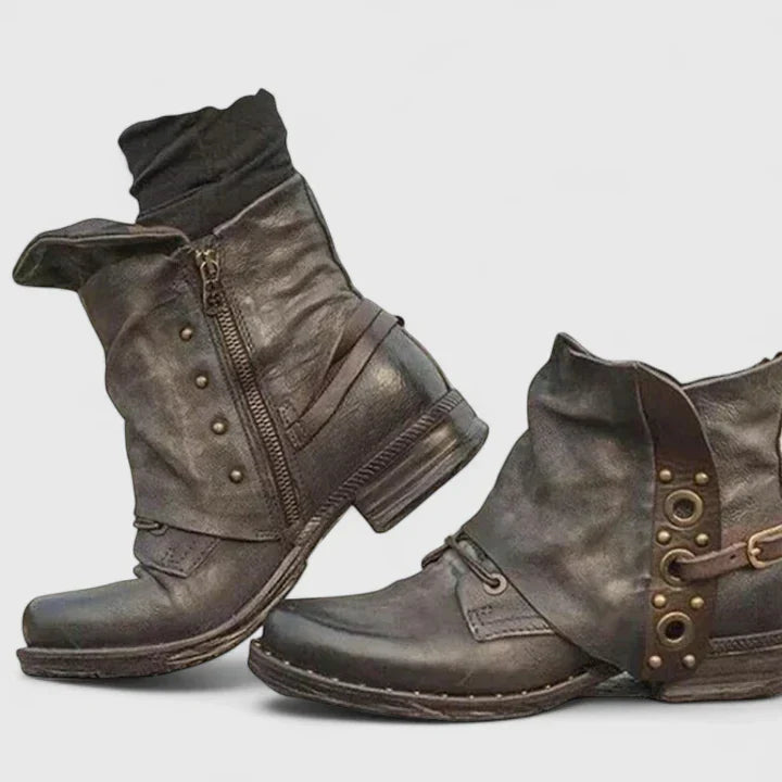 Pair of women's brown buckle ankle boots, versatile for everyday wear and spring outfits, with a western flair