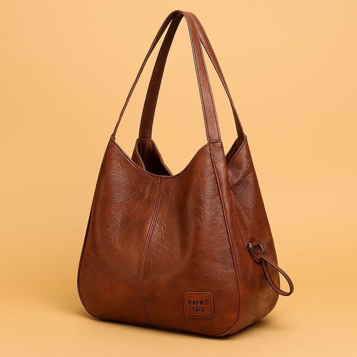 Women's vintage faux leather handbag set with a large tote, crossbody bag, clutch, and wallet, brown