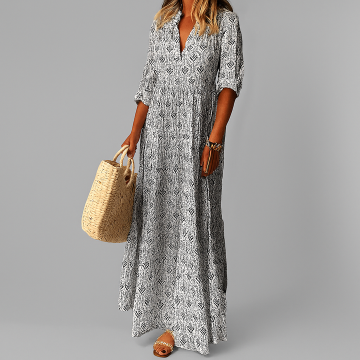 Lightweight women's maxi dress featuring a vintage pattern and comfortable 3/4 sleeves.