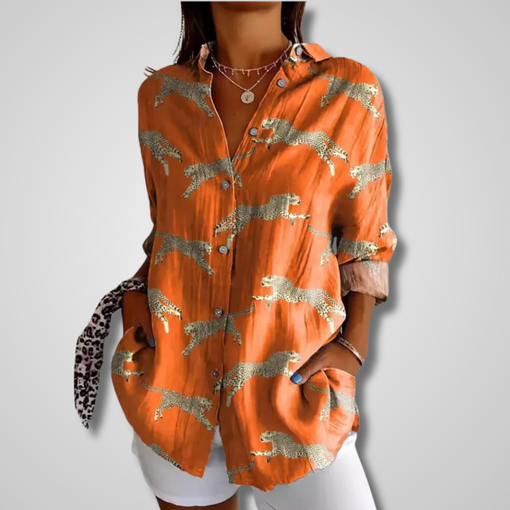 Loose-fitting women's vintage white button-up shirt, a breathable top for relaxed summer fashion.
