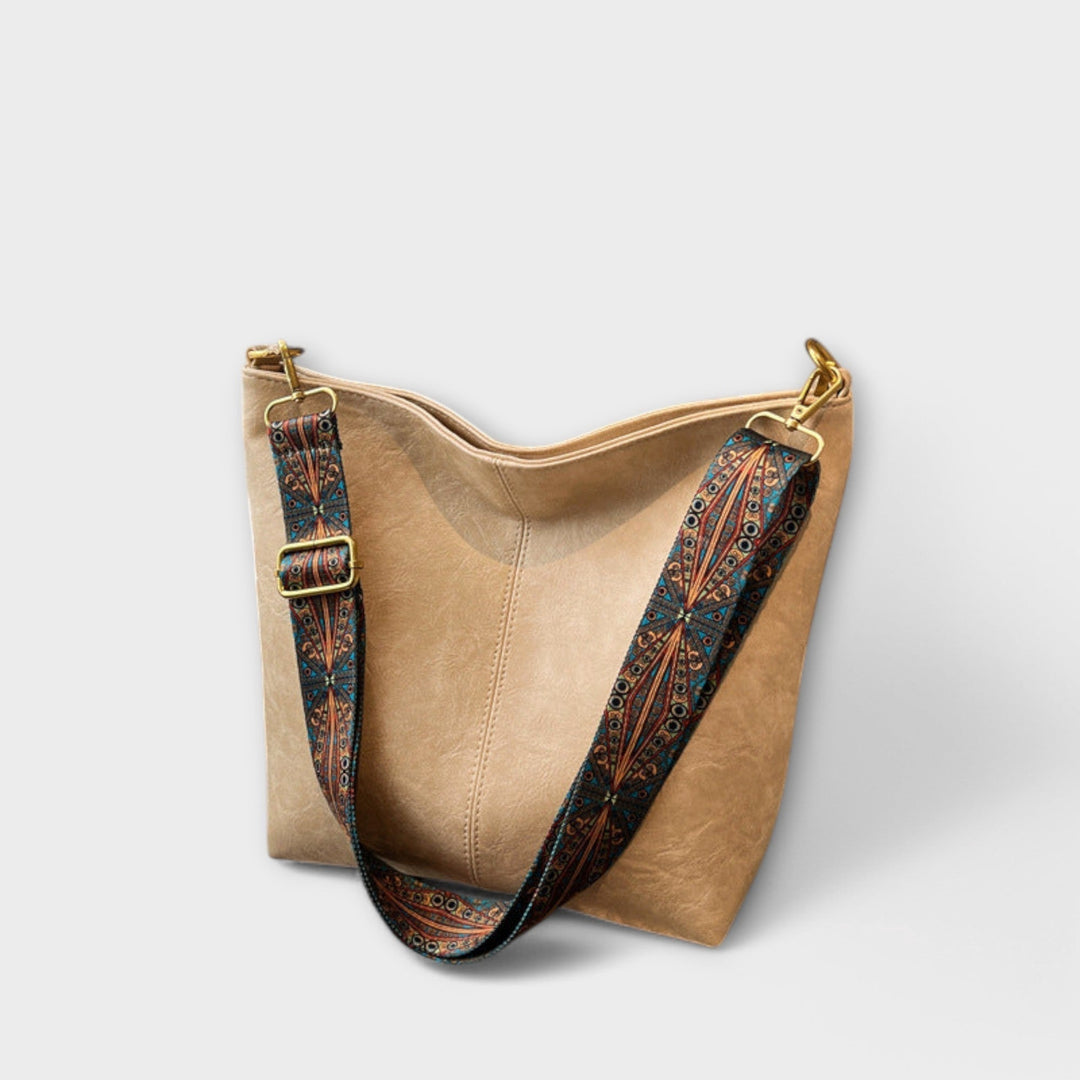 Stylish women's vintage shoulder bag, perfect everyday accessory with an embroidered strap