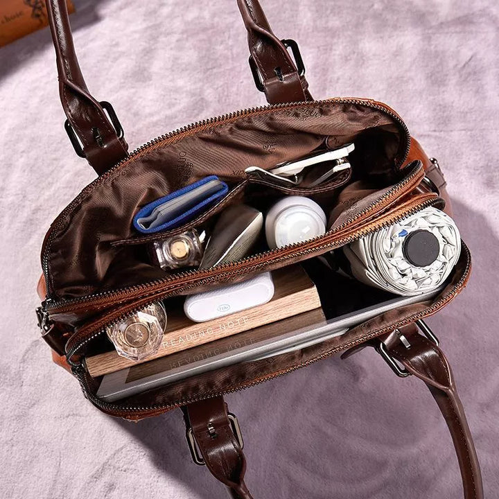 Stylish brown vegan leather women's handbag, a vintage style elegant purse and daily essentials shoulder bag.