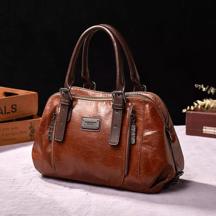 Classic black women's elegant purse, a timeless vintage style vegan leather shoulder bag for daily accessories.