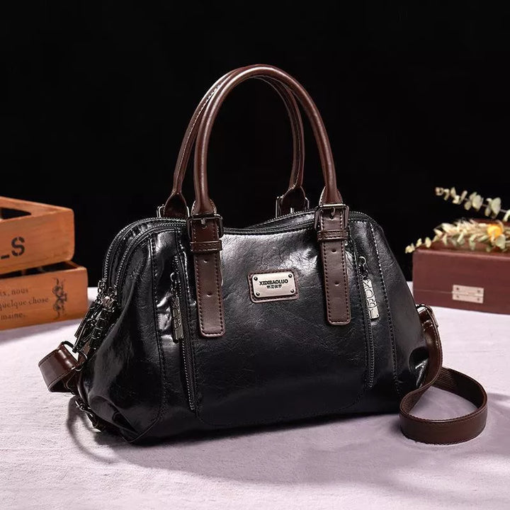 Green women's vintage style handbag, an elegant vegan leather shoulder bag, perfect for classic daily essentials.