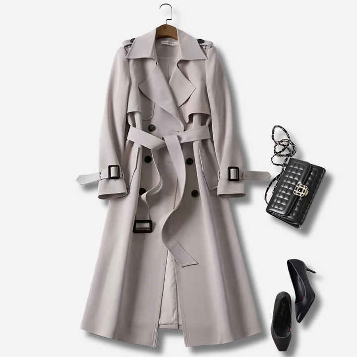 Elegant black women's vintage trench coat. A classic long fashion jacket, perfect outerwear for sophisticated style.