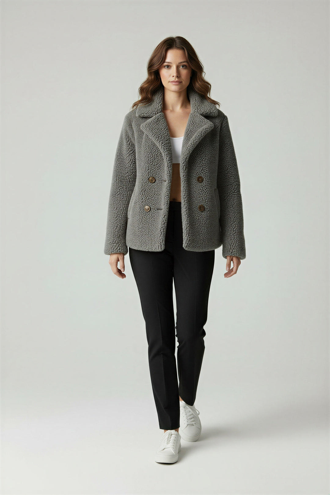 Front view: Women's warm oversized winter coat, relaxed fit. Cozy, stylish outerwear for everyday comfort in winter.