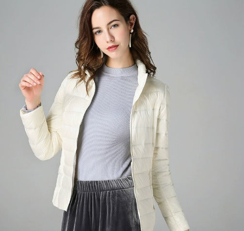 Long-sleeve women's warm puffer jacket, a stylish winter coat providing ultimate comfort in cold weather.