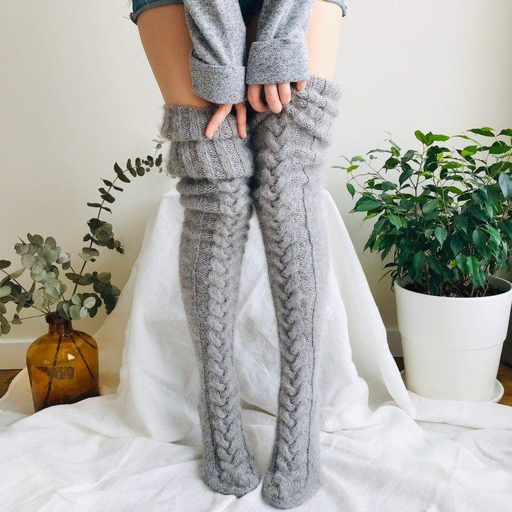 Women's warm thigh high socks for cozy winter comfort. Soft, elastic legwear, perfect for loungewear.