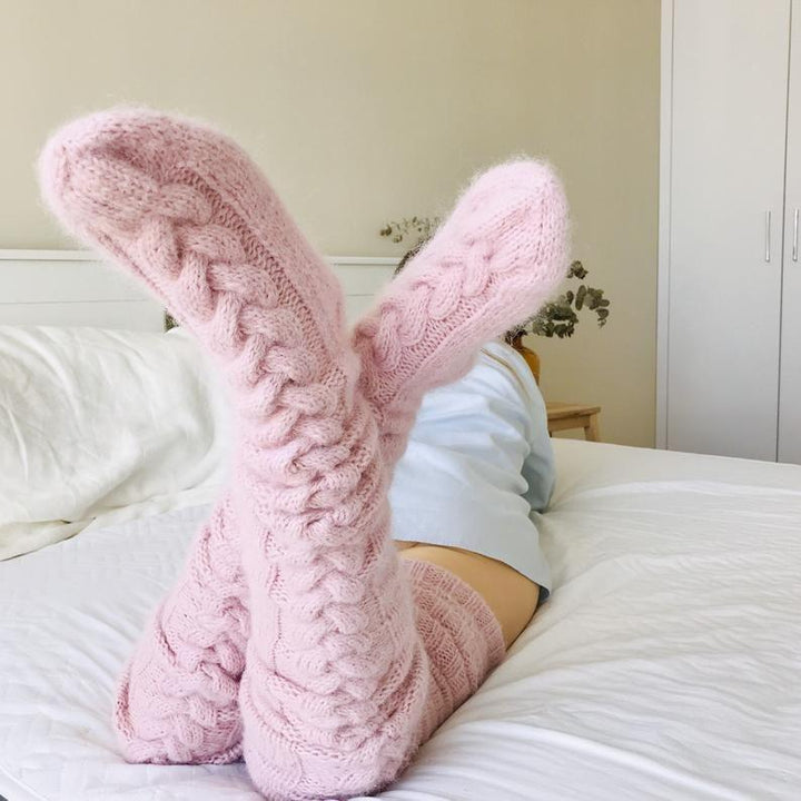 Long women's comfortable thigh high socks. Warm and cozy winter legwear, perfect for cold days or relaxing.