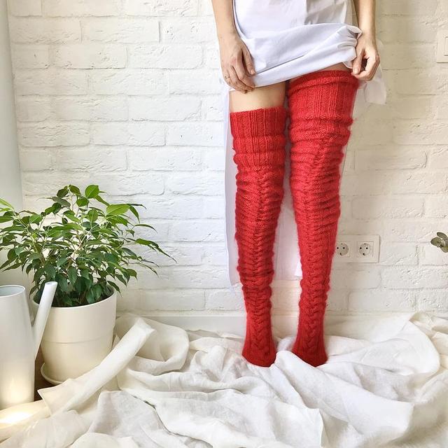 Warm women's thigh high socks, providing ultimate comfort. Soft, elastic legwear for cozy winter days.