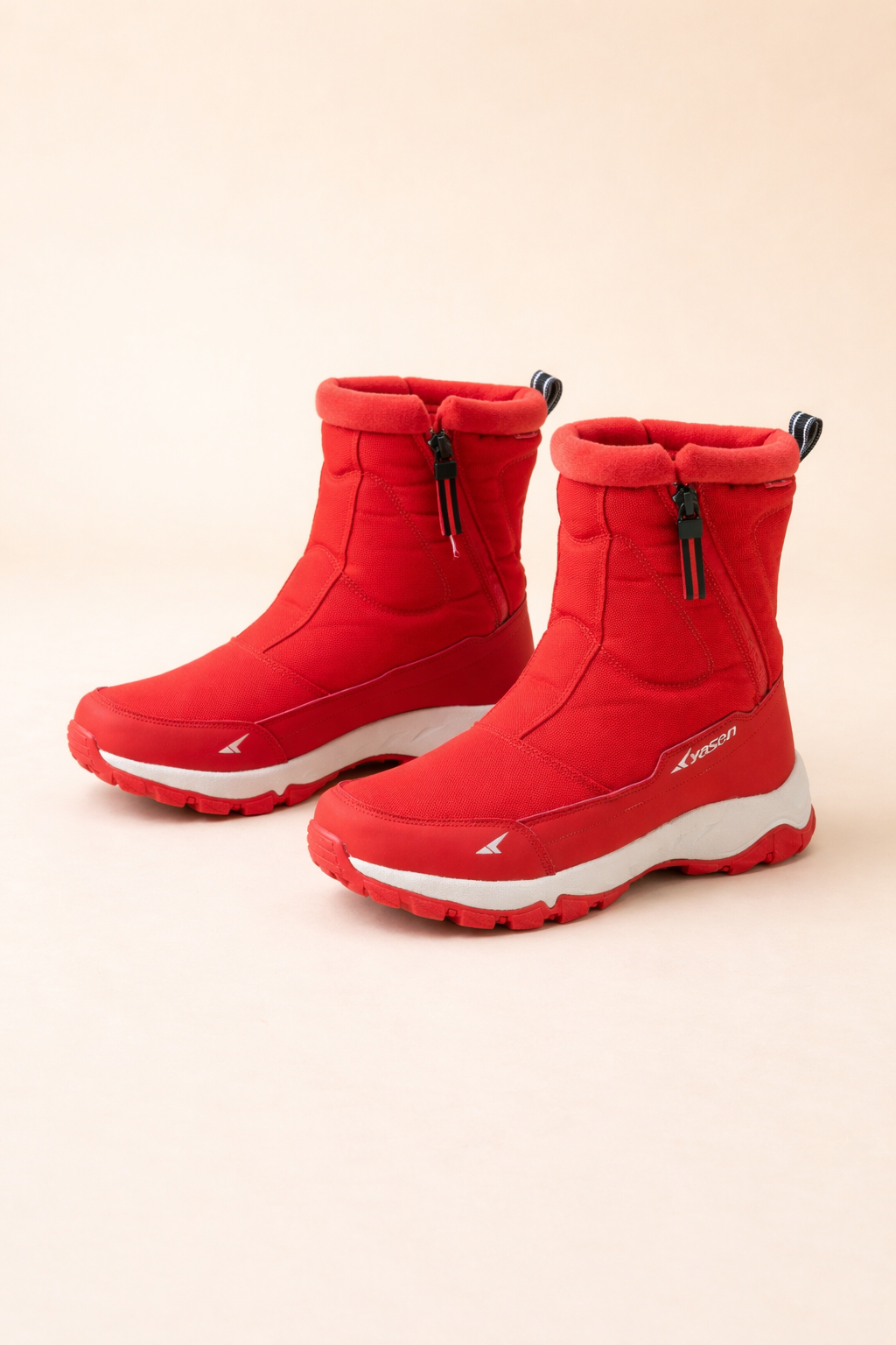 Durable women's ankle snow boots, waterproof & non-slip, providing warmth & stability for harsh winter conditions.