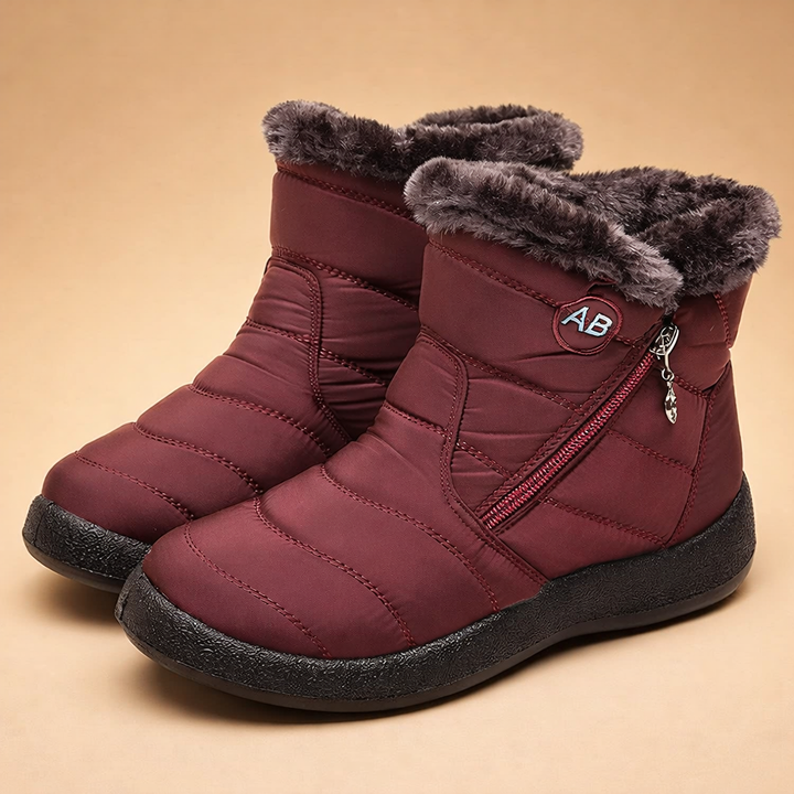 Gray women's warm winter ankle boots, cozy slip-on design for everyday comfort.
