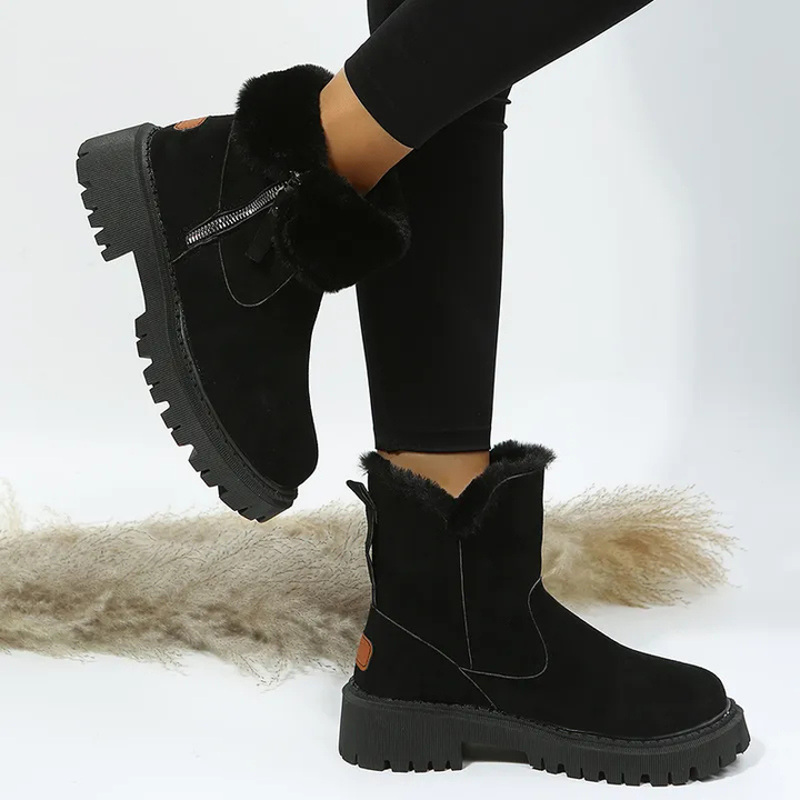 Fashionable women's winter boots with plush interior, offering warmth and comfort