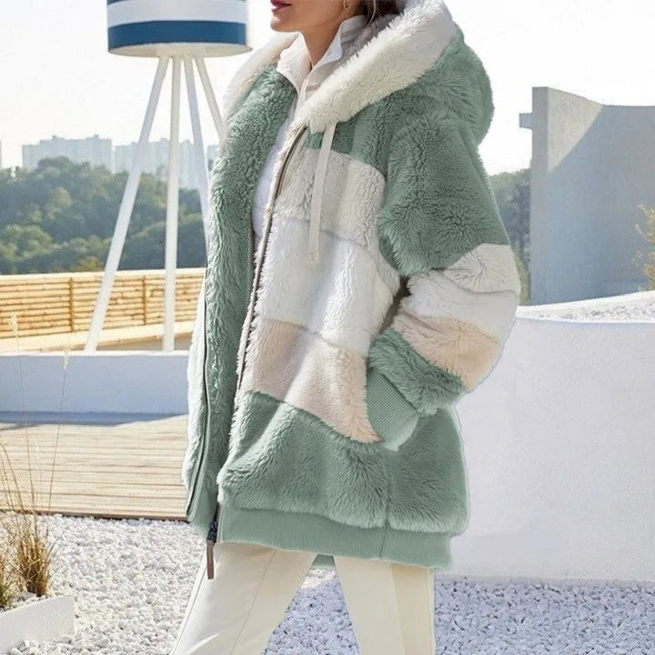 Adventure-ready women's hooded winter coat, orange, with zip closure and cold weather insulation
