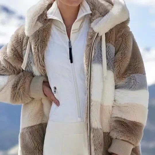Model wearing a stylish women's hooded winter coat, purple, zip up, suitable for cold climates