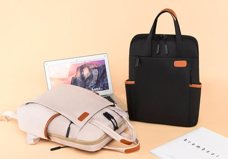 Interior of women's anti-theft travel backpack, water-resistant, showing organized compartments.